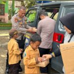 Polres Nganjuk Dukung Program MBG, Bagikan Makanan Siang Bergizi Gratis untuk Siswa SD/Humas Polres Nganjuk